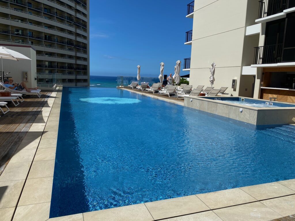 Infinity pool at the Halepuna resort in Waikiki with the ocean beyond. 