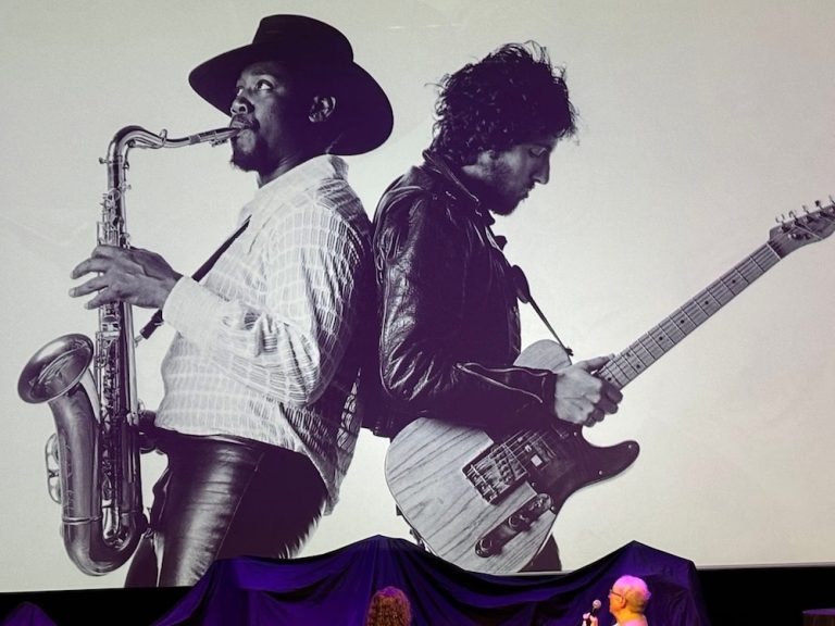 Photo by Eric Meola shown on stage during the Born to Run Symposium. Features Bruce Springsteen and Clarence Clemons during the photo shoot in 1975.